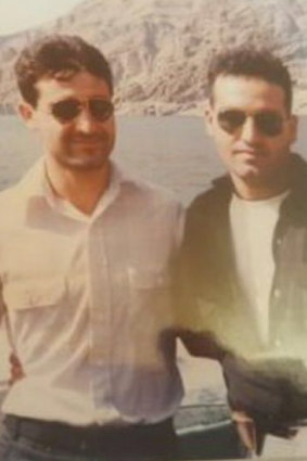Mehdi Hamidpour,  left, in Iran. He was persecuted and fled, seeking asylum in Australia. 