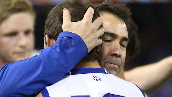Emotional scenes as Scott embraces Ben Cunnington after North's win. 