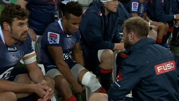 Will Genia's knee is treated on the sideline on Friday night.