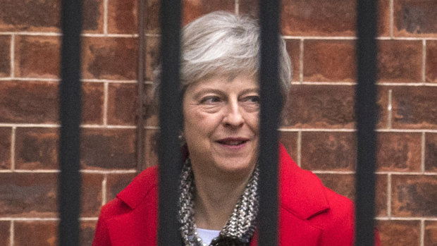 Britain's Prime Minister Theresa May leaves Downing Street on Friday.