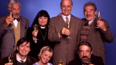 John Bluthal (left with bow tie) as Frank Pickle in The Vicar of Dibley. 