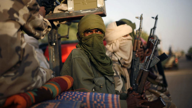 Tuareg Malian soldiers  patrol the streets of Gao, northern Mali. Mali has been in turmoil since Tuareg rebels and loosely allied Islamists took over its north in 2012.