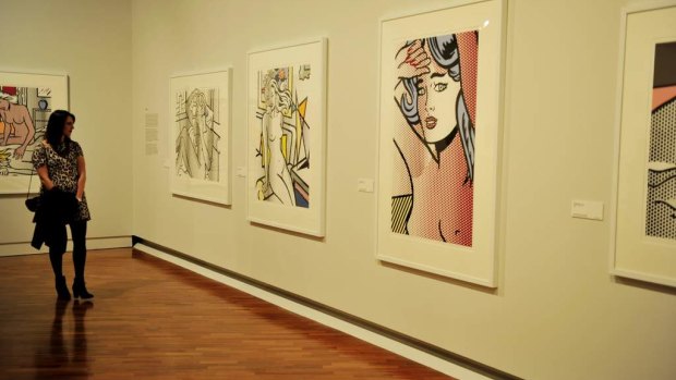 People's reactions to works of art are being studied. Pictured: a visitor to the National Gallery of Australia's Roy Lichtenstein exhibition.
