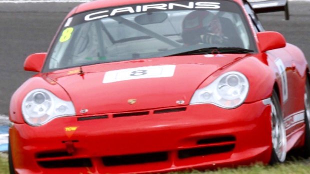 Justice Lasry at the wheel of his racing Porsche 996.
