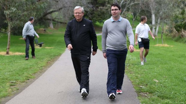 Prime Minister Kevin Rudd walks with advisor Patrick Gorman during an early morning walk in Adelaide.