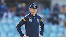 Brumbies coach Stephen Larkham looks on.