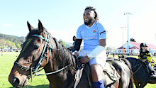 Ma'a Nonu rides a horse at Whakarua Park in Ruatoria.