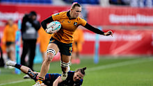 Maddison Levi of Australia breaks a tackle.