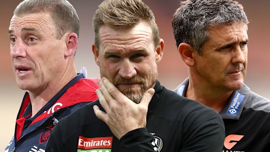 AFL coaches Simon Goodwin, Nathan Buckley and Leon Cameron. Part of a club’s senior coach’s wage may be exempt from its football department spending next year.