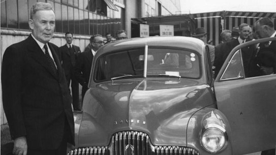 1948: the then Prime Minister Mr J B Chifley with Holden No 1 at GMH Fishermans Bend.