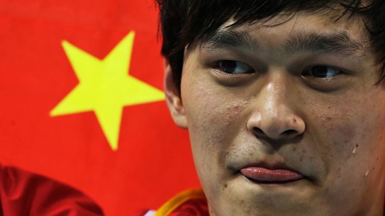 China's Sun Yang wins gold and breaks the world record in the men's 1500m freestyle.