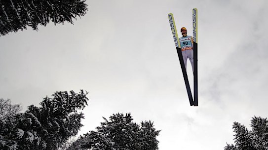 Poland's Kamil Stoch soars through the air during the FIS World Cup ski jump event in Engelberg.