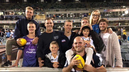 Lachlan McCaffrey with his siblings after a Brumbies game.