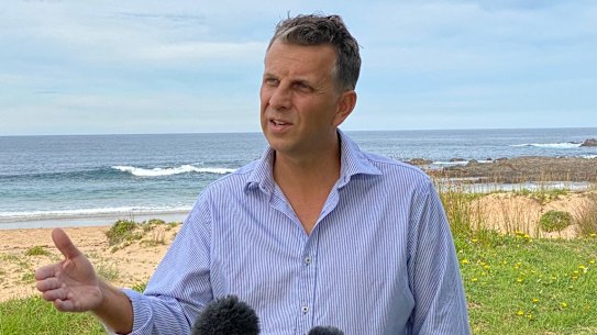 NSW Transport Minister Andrew Constance in his electorate on Wednesday. He has blamed his colleagues for a smear campaign that ended his federal byelection hopes. 