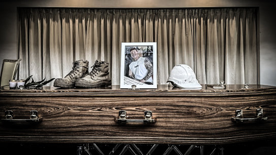 Ben Nash’s coffin at his funeral where his love of construction was clear.