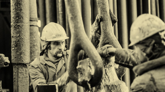 Workers in a petrol plant in Kazakhstan in 1990.