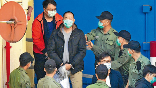 Gordon Ng (centre) was first detained in 2021.