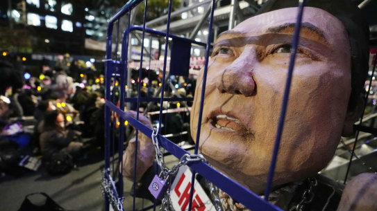 A caricature depicting an imprisoned South Korean President Yoon Suk Yeol is displayed during a rally outside the National Assembly in Seoul.