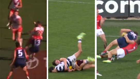 Fierce tackles: Clayton Oliver, Will Day and Zach Merrett.
