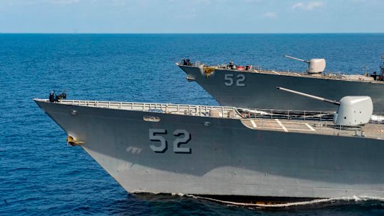 Rising tensions: US Navy ships pass through the South China Sea.