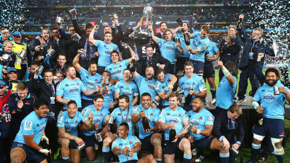 The Waratahs celebrate after beating the Crusaders in the 2014 Super Rugby final.