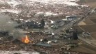 Houses are washed away by the tsunami in Sendai. 