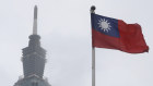 FILE - A Taiwan national flag flutters near the Taipei 101 building at the National Dr. Sun Yat-Sen Memorial Hall in Taipei, Taiwan, May 7, 2023. (AP Photo/Chiang Ying-ying, File)