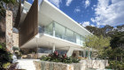 There are cantilevered verandahs that overlook a sunken lounge by the swimming pool.