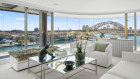 The Lewis family are selling their north-east corner apartment in the Quay Grand. 