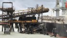 Damage inflicted on a manganese loading wharf after bulk carrier MV Anikitos crashed into it during Cyclone Megan on Groote Eylandt.