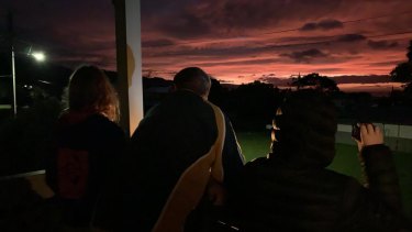 Andrew Borthwick's family on their balcony at Apollo Bay on Anzac day.