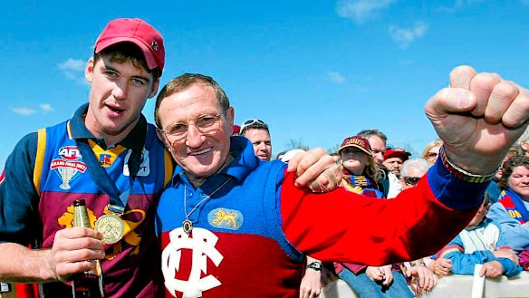 Jonathan Brown and Fitzroy legend Kevin Murray celebrate after the Brisbane Lions won the 2003 premiership.
