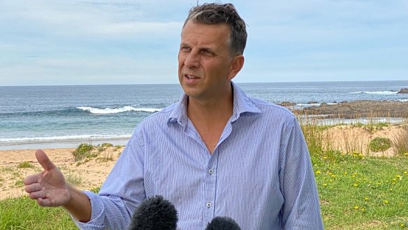 NSW Transport Minister Andrew Constance in his electorate on Wednesday. He has blamed his colleagues for a smear campaign that ended his federal byelection hopes. 