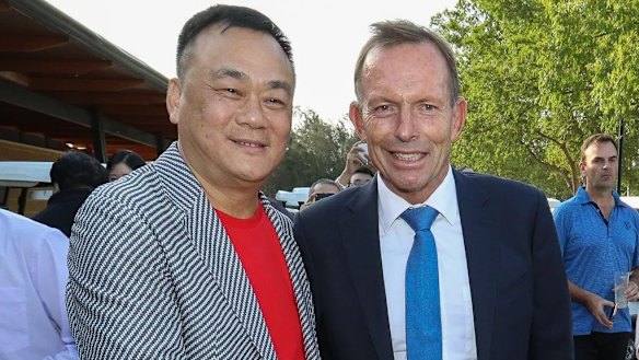 Jack Lam and Tony Abbott the Twin Creeks Golf and Country Club in 2018. 