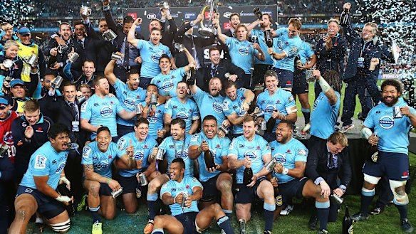 The Waratahs celebrate after beating the Crusaders in the 2014 Super Rugby final. 
