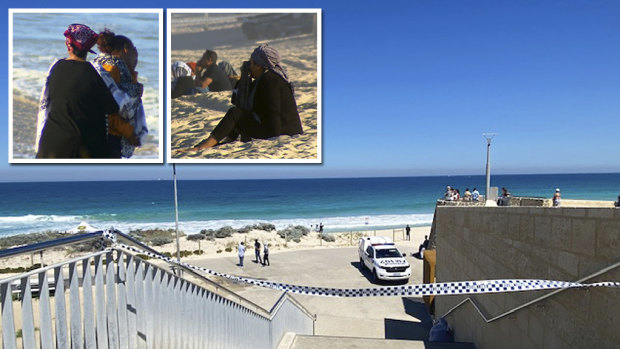 Distressed loved ones of the teenager missing off Scarborough beach watch on as the search continues. 