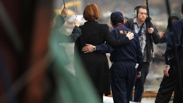 Then prime minister Julia Gillard and mayor Jin Sato in Minamisanriku in 2011. 