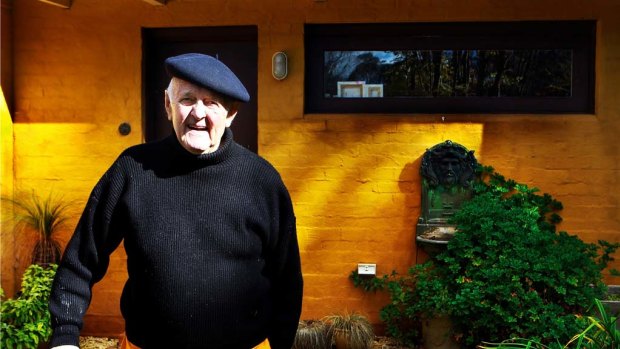 Australian artist John Olsen outside his studio at home. 