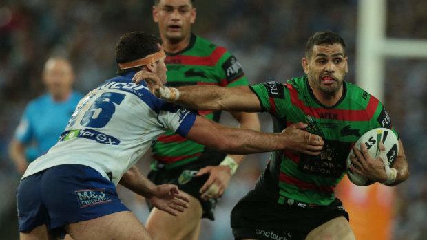 Rising above: Greg Inglis was instrumental for the Rabbitohs in their 2014 grand final victory.