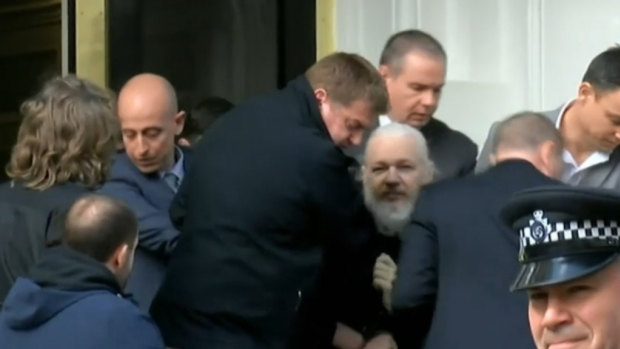 Julian Assange as he was arrested by British police.