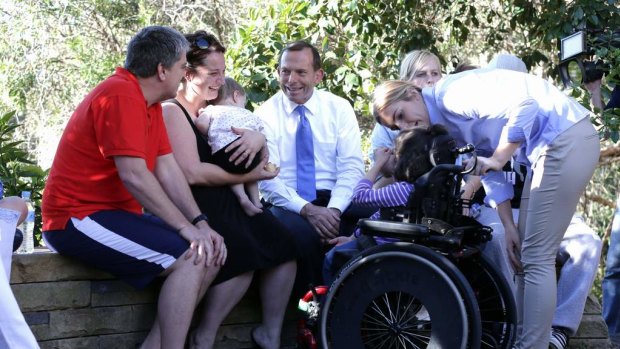 Opposition Leader Tony Abbott meets with families during his visit to Bear Cottage in Manly.