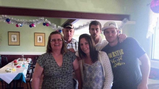 Ms Broadbent (centre) with her family. 