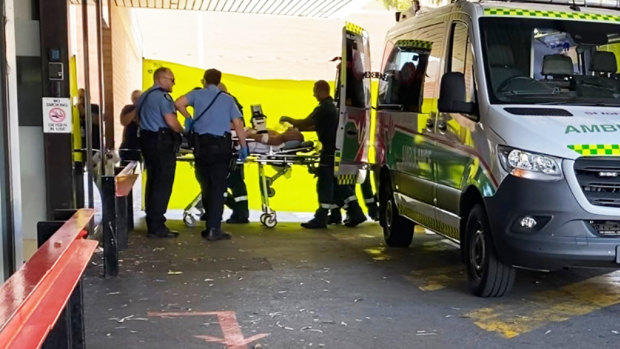 The man attacked by a shark in the Swan River on Thursday morning arrives at hospital. 