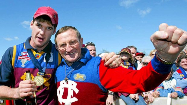 Jonathan Brown and Fitzroy legend Kevin Murray celebrate after the Brisbane Lions won the 2003 premiership.