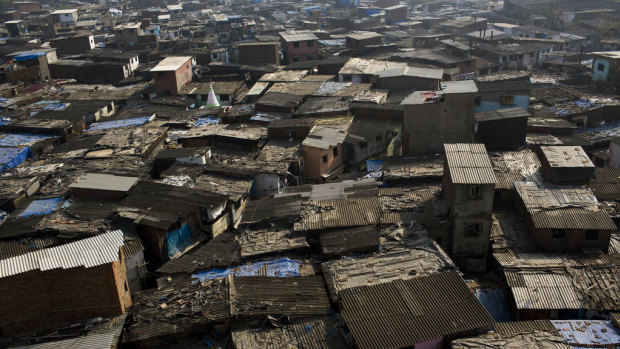 Informal housing stands in the Dharavi slum area of Mumbai. 