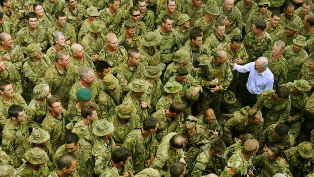 Then prime minister John Howard meeting Australian Troops in East Timor's capital city of Dili in 2006.
