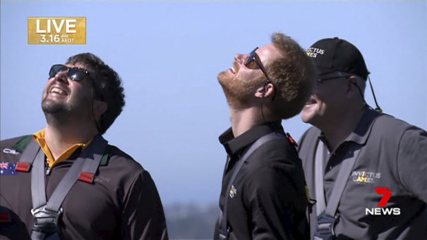 Prince Harry admires the Invictus Games flag that was raised this afternoon on the Sydney Harbour Bridge.