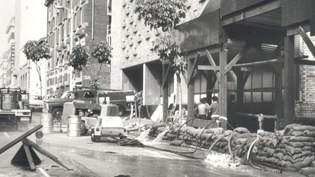 Sandbags outside the Edison telephone exchange on Elizabeth Street during a flood.