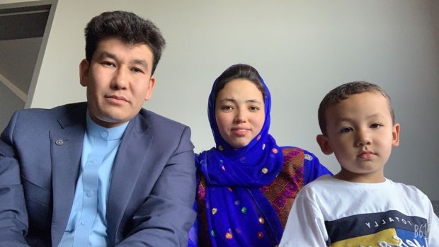 Afghan Australian Neamat Rahimi, his wife, Fouzia, and four-year-old son, Mirwais, in hotel quarantine in Melbourne.