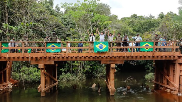 The wooden bridge inaugurated by Brazilian President Jair Bolsonaro leads to an area where major reserves of niobium have been found.